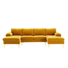 a yellow sectional sofa with chaise lounger and footstool in front of a white background