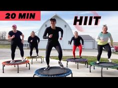 a group of people standing on top of trampoline