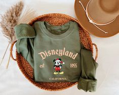 Magical Land Christmas Sweatshirt, Trendy Sweatshirt, Disneyland Sweatshirt, Oversized Sweatshirt, Christmas Sweatshirt, Christmas Gift HOW TO ORDER: ----------------------- ✔ Placing an order is a breeze. Just ensure you've checked the color, size, and item description. Follow these steps: * Pick your size and preferred color from the first drop-down menu. * If customization is an option, tick the personalization box and provide the necessary details. * Specify the quantity and add the item to Disneyland Sweatshirt, Mickey Sweatshirt, Disneyland Halloween, Disneyland Shirts, Magical Land, Sweatshirt Trendy, Sweatshirt Oversized, Halloween Sweater, Sweatshirt Halloween