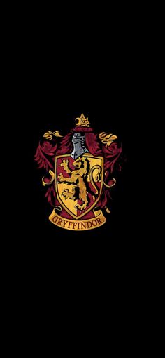 the hogwarts crest is shown on a black background with red and yellow accents