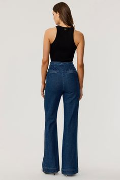 Inspired by Parisian chic and Jane Birkin's timeless style, the Birkin High-Waisted Lace Up Flared Jeans offer the perfect blend of fashion and comfort. These high-waisted denim pants provide a form-fitting silhouette with added stretch, ensuring all-day comfort. The lace-up front detail adds an edgy twist to these classic flared jeans, making them an ideal choice for stylish jeans for women looking for a high waist, Parisian-inspired look. Ultra High Waist Jeans, Stylish Jeans For Women, Ultra High Waisted Jeans, Stylish Jeans, Denim Chic, 2025 Fashion, Jane Birkin, Parisian Chic, High Waisted Jeans