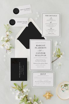 an elegant black and white wedding suite