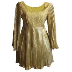 Vintage Gold Lame Dress. Fully Lined With Zipper. Marked Size 9. Bell Flutter Sleeves And Hem Baby Doll Style. Gold Lame Fabric. Definately A One Of A Kind. Measurements Of Dress Are Bust 34 Waist 28 Hips 34. Length Is 32 Inches From Top Shoulder To Bottom Hem. I Would Recommend If Purchasing Make Sure Your Measurement Smaller Than Above. The Dress Is Lined And Liner Has No Give Or Stretch So To Ensure Being Comfortable In Dress You Would Have To Measure A Bit Smaller Than Measurements Due To Lining. Gold Lame Dress, Lame Dress, Knee Length Cocktail Dress, Lame Fabric, Gold Lame, Baby Doll Dress, Gold Dress, Babydoll Dress, 8 M