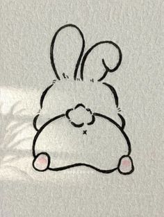 a drawing of a bunny with a heart on it's chest and eyes closed