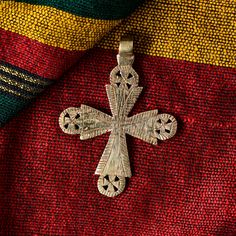 Handmade Ethiopian orthodox church neck cross made of bronze. Uniquely made cross pendent by seasoend Ethiopian artisian using lost wax method of jewelry making and hand engraved to give it a final touch.  The cross measures 75 x 55 mm.(HxW)  Please visit my shop for similar items and buy more and save more on shipping. Ethiopian neck cross orthodox church neck cross pendant African beads handmade Traditional Handmade Crucifix Necklace, Handmade Bohemian Cross Pendant Necklace, Handmade Bohemian Cross Necklace, Bohemian Handmade Cross Necklace, Ethiopian Orthodox Church, Ethiopian Cross, Cross Pendent, Coptic Cross, Orthodox Church