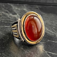 Mens Red Agate Gemstone Silver Ring , Handmade Vibrant Color Agate Ring , Greek Style Columns Motif Ring , 925K Sterling Silver , Gift For Him , Same Day For Shipping ✧ Product Details * Handmade İtem * Gender : Male / Female * Material : 925K Sterling Silver * Ring Weight : 19 Grams * Gemstone Type : Red Agate ✔ Usage Details * Silver jewelry is very sensitive to chemicals. It is recommended to keep away from chemical substances such as cream, bleach, deodorant, detergent. * Silver jewelry can also darken quickly in salt water, that is, in sea water. For this reason, it is best to remove them when swimming in the sea. ✔ Shipping * Your orders placed on weekdays are delivered to the cargo on the same day. Your orders placed on the weekend are delivered to the cargo on Monday. ✔ Other Detai Red Carnelian Hallmarked Rings, Red Carnelian Signet Ring For Anniversary, Red Oval Cabochon Gemstone Signet Ring, Red Opal Gemstone Ring For Formal Occasions, Chemical Substances, Greek Style, Agate Ring, Red Agate, Agate Gemstone