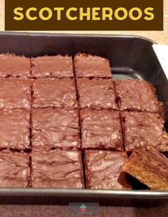 a pan filled with brownies sitting on top of a counter