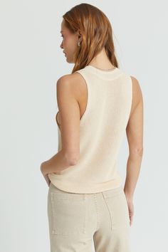 Our ribbed knit sleeveless top is the essential warm weather top. It's airy and shows just enough shoulder for a cool summer look. Trendy Ribbed Summer Vest, Trendy Knit Vest For Day Out, Chic Ribbed Top For Spring, Chic Ribbed Spring Top, Summer Ribbed Tank Vest, Ribbed Tank Vest For Summer, Chic Stretch Vest For Spring, Casual Ribbed Summer Vest, Casual Textured Knit Sweater Vest For Spring