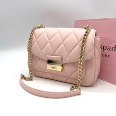 Brand New With Tag Kate Spade Carey Small Quilted Flap Shoulder Crossbody Bag Product Details Measurements 9.4" W X 6.2" H X 3" D Color: Conch Pink Features Strap Drop: 20.5" On Hardware Logo Closure Type: Flap With Push Lock Closure Dust Bag Included: No Interior: Back Zip Pocket Exterior: Front Slip & Back Zip Pocket Materials Quilted Leather Lining: Two Way Spade Jacquard Lining Imported Style Number Ka767 Luxury Pink Shoulder Flap Bag, Luxury Pink Flap Bag With Removable Pouch, Luxury Pink Flap Bag With Detachable Strap, Pink Flap Bag With Detachable Strap For Travel, Pink Satchel Flap Bag For Travel, Pink Top Handle Flap Bag For Evening, Chic Pink Flap Bag For Travel, Chic Pink Bag With Chain Strap, Pink Shoulder Bag With Chain Strap