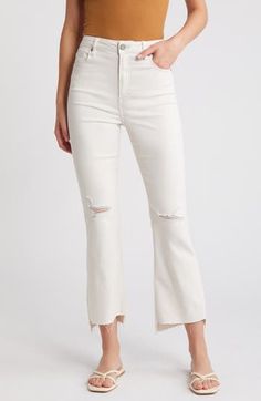 Laid-back and perfect for casual days, these cropped high-waist wide-leg jeans feature raw step hems and shredded knees for edgier styling. 27" inseam; 11 1/2" front rise Zip fly with button closure Five-pocket style 57% cotton, 35% Tencel® lyocell, 6% polyester, 2% spandex Tencel lyocell is a more-sustainably produced fiber made with closed-loop processing Machine wash, tumble dry Imported Chic Ripped High Rise Flare Jeans, Chic High Rise Ripped Flare Jeans, Chic Cropped Jeans With Frayed Hem For Fall, Chic Ripped Cropped Leg Bottoms, Chic Ripped High-waist Cropped Jeans, Chic High Waist Ripped Cropped Jeans, Chic Distressed Cotton Flare Jeans, White High Rise Flare Jeans With Frayed Hem, White High-rise Flare Jeans With Frayed Hem