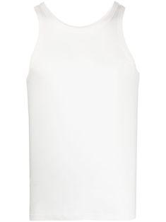 white cotton sleeveless round neck straight hem This item is made from at least 50% organic materials. Learn more about what makes a product Conscious on our Conscious Criteria page White Cotton Basic Tank Top, Basic White Cotton Tank Top, White Cotton Sleeveless Muscle Tee, White Sleeveless Cotton Muscle Tee, White Sleeveless Cotton Vest, Classic Cotton Sleeveless Tank Top, White Cotton Crew Neck Tank Top, Everyday White Cotton Vest, White Crew Neck Cotton Tank Top