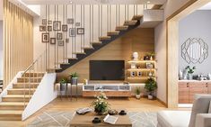 a living room filled with furniture and a flat screen tv sitting on top of a wooden table