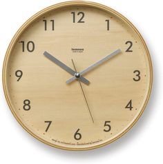 a wooden clock with numbers on the face