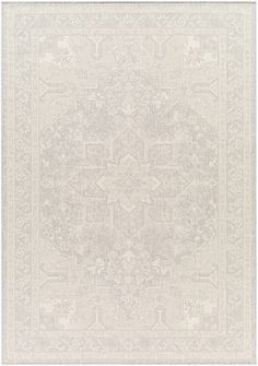 a white rug with an intricate design on the top and bottom, it is very soft