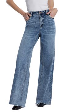 Raw hems refresh the retro style of elongating wide-leg jeans crafted from faded low-stretch denim. 32" inseam; 23" leg opening; 10 1/4" front rise Zip fly with button closure Five-pocket style 67% cotton, 27% REPREVE® recycled polyester, 5% rayon, 1% spandex REPREVE recycled polyester is made from 100% post-consumer recycled plastic bottles Machine wash, tumble dry Imported Washed Blue Straight Leg Jeans With Frayed Hem, Trendy Washed Blue Straight Leg Cropped Jeans, Washed Blue Wide Leg Cropped Jeans, Dark Wash Wide Leg Cargo Jeans, Washed Denim Blue Cropped Flare Jeans, Blue Washed Wide Leg Cropped Jeans, Denim Blue Washed Cropped Flare Jeans, Blue Washed Wide-leg Cropped Jeans, Wide Leg Washed Denim Jeans