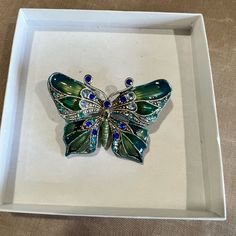 Nib Beautiful Butterfly Brooch With Jade Colored Stones And 2 Shades Of Blue Accenting The Wings In Enamel Setting. Colored Stones, Butterfly Brooch, The Wings, Blue Accents, Beautiful Butterflies, Shades Of Blue, Stone Color, Brooches, Jade