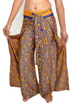 These wrap pants are so comfortable to wear. These pants come in endless variety of wonderful assorted patterns. These boho sari trousers are from our range of bohemian clothing. Unique clothing for everyone to use on different occasions. Each Piece is Unique and fine clothing symbols. These pants are made of quality silk blend or sari fabric. These are perfect pant for evening wear, beach cover ups, casual wear, formal wear, party wear or use your own exciting look. These pants are sewn in our Clothing Symbols, Thai Fisherman Pants, Fisherman Pants, Wrap Pants, Pantsuits For Women, Boho Pants, Plus Size Pants, Pants And Leggings, Silk Pants