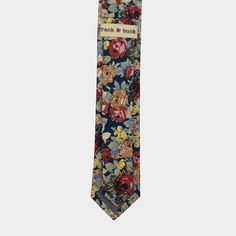 Our Anson Tie has all your favorite colors in one swell floral print. Perfect for gray, blue, or tan suits. Details: ➢ 100% Cotton ➢ 60.25” x 2.25” Summer Formal Suit And Tie Accessories With Floral Print, Spring Floral Print Fitted Suit And Tie Accessories, Classic Fitted Floral Print Ties, Classic Fitted Ties With Floral Print, Classic Floral Print Summer Tie, Classic Floral Suit And Tie Accessories For Spring, Classic Floral Print Suit And Tie Accessories For Spring, Floral Print Suit And Tie Accessories For Spring Business, Classic Floral Print Ties For Summer