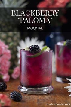 the blackberry palo cocktail is garnished with blackberries