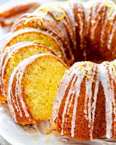 a bundt cake with white icing on a plate