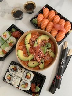 sushi platter with salmon, avocado and cucumber