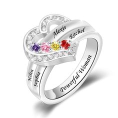 two hearts with names engraved on each side and three stones in the middle, surrounded by diamonds