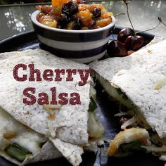 a plate topped with quesadillas and fruit