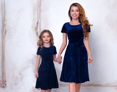 "Mommy and me navy blue velvet dresses, Flower girl dress, Mother and daughter dresses, Mother and daughter matching dress, Christmas photoshoot dress for mother and daughter Material - Stretchy velvet, soft fabric ADJUSTMENTS We can make any length adjustments special for you and for free! IMPORTANT INFORMATION PAYMENTS There is no need to have an account on PayPal to pay for your order on Etsy. You can pay by your _credit card_. This is how to do that: when you get to the PayPal payment page, Blue Velvet Dresses, Blue Velvet Christmas, Dress Mother And Daughter, Royal Blue Velvet Dress, Mother And Daughter Dresses, Dress For Mother, Navy Blue Velvet Dress, Kids Fancy Dress, Dresses Christmas