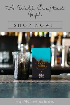 an image of a bar with the words bull china on it and two shot glasses