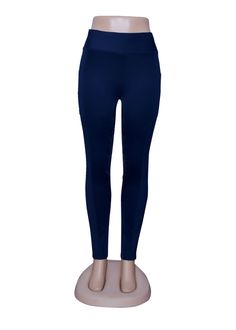 a female mannequin wearing blue pants and tights with her legs spread out