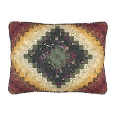 a decorative pillow with an intricate design on the front and back, made out of multicolored fabric