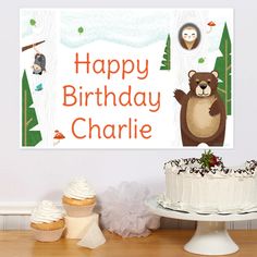 a birthday card with an image of a bear and other animals on it, next to cupcakes