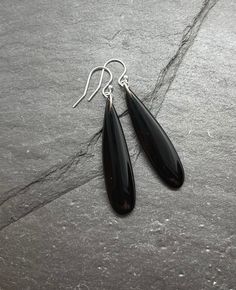 Sterling Silver Obsidian Earrings, Black Obsidian Teardrop earrings, Natural Obsidian Protection Gemstone These classic, Black Obsidian gemstone and sterling silver earrings are a perfect add to any wardrobe. The all natural, rich color tone found in these gemstones is shown if by their teardrop shape. The dangle style and genuine sterling silver ear wires make this pair of earrings a long lasting gift for you or that special someone. About the Gemstone: Obsidian is known for its unique protecti Elegant Teardrop Earrings With Natural Stones, Elegant Obsidian Jewelry For Healing, Classic Black Teardrop Earrings, Black Teardrop Gemstone Earrings, Unique Handmade Obsidian Jewelry, Adjustable Spiritual Obsidian Jewelry, Black Natural Stones Drop Earrings, Black Natural Stone Dangle Earrings, Obsidian Earrings