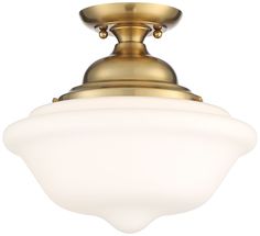 a light fixture with a white glass shade