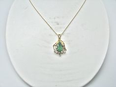 "For Sale: (1) H280 Stunning 14k Yellow Gold Emerald Necklace with Multiple Diamonds PLEASE READ ENTIRE DESCRIPTION BEFORE PURCHASING Pre-owned item. This is beautiful 14k yellow gold necklace featuring pear shaped Emerald in the center with multiple diamonds of different shape around it. No visible flaws, just some scratches please see pictures for details. Sold as is, as seen on pictures. There are earrings available that go with this necklace, and those earrings sold separately. Specifics: * Gold Emerald Necklace, 14k Yellow Gold Necklace, Opal Ring Gold, Yellow Gold Necklace, Emerald Necklace, Filigree Ring, Long Pendant, Silver Chain Necklace, Saint Louis