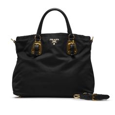 This Prada TessuTo handbag is made of black nylon canvas and has rolled leather indexes. The Bag is also decorated with gold -colored details. A golden Prada lettering shines on the front. The Bag Has a magnetic closure at the upper opening. Inside the Bag there are a zipper compartment and a slide compartment. The Bag can be in the hand or with a removable leather shoulder strap over the shoulder. Luxury Gold Satchel With Leather Handles, Gold Travel Satchel With Branded Hardware, Designer Gold Satchel With Leather Handles, Celine Bags, Handbag Black, Handbag Wallet, Wallet Accessories, Black Nylon, Fendi Bags