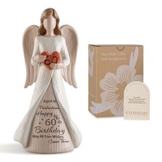 an angel figurine next to a box of birthday cards and a card for someone special