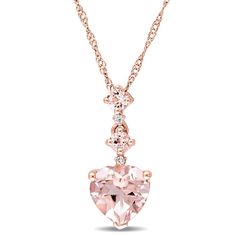 With subtle diamond accents, this heart-shaped morganite drop pendant is tickled pink in 14K rose gold. The beauty of a heart-shaped gemstone is both sentimental and stunning. And the blush light of a morganite is enhanced by its passion-igniting facets. Morganite Necklace, Morganite Jewelry, Morganite Pendant, Tiered Necklace, Rose Gold Morganite, Morganite Diamond, Drop Pendant Necklace, Heart Pendant Gold, Rose Gold Heart