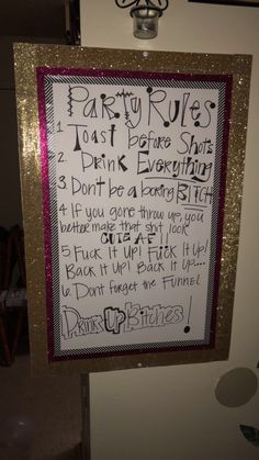 a sign hanging on the side of a wall that says, party rules just before shot