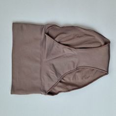 Iris Color, Size Xsmall. Full Panty, Firm Control. Rubber Inside Waistband For Hold. Fabric Is 78 % Nylon, 22% Spandex. Fitted Seamless Brown Bottoms, High Stretch Bottoms With Built-in Bra For Loungewear, High Stretch Seamless Brown Bottoms, High Waist Seamless Bottoms For Loungewear, High Waist Seamless Loungewear Bottoms, Seamless Snug Fit Bottoms For Loungewear, Seamless Snug Fit Loungewear Bottoms, Seamless Fitted Bottoms For Relaxation, Fitted Bottoms With Soft Touch For Relaxation