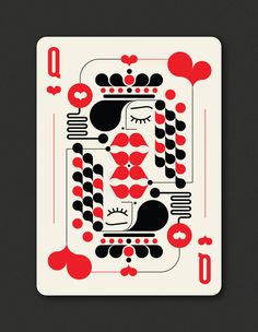 a playing card with red and black designs on it