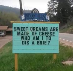 a sign that says sweet dreams are made of cheese who am i to dis a brie?