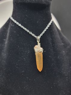 Natural Raw Tangerine Quartz Gemstone. This Stone has a soothing orange glass like color. The wire used for wrapping is silver plated. Tangerine Quartz has the ability to cut through the smoke and the shadows and clear your inner sight, giving you the discernment and clarity to keep going in your emotional journey. Tangerine Quartz will inspire the joyful energy of your inner child and encourage your curiosity and playfulness. You can choose to buy the pendant by itself or with a chain for an ad Topography Embroidery, Tangerine Quartz, Honeycomb Necklace, Embroidery Necklace, Amazonite Necklace, Wire Wrap Pendant, Lace Choker, Art Pendant, Green Lace