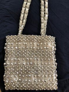 Beaded crossbody bag fully lined with silver satin fabric. It has a small inside pocket. Very good condition. No tags or labels. Vintage unknown. Beaded Crossbody Bag, Rhinestone Handbags, Round Purse, Sustainable Leather, Wedding Clutch, Sling Bags, Evening Handbag, Purse Accessories, Doll Sets