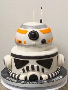 a star wars cake with a robot on top