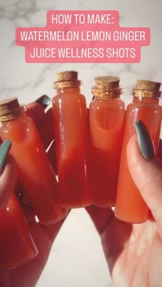 a person holding five bottles of juice with the words how to make watermelon lemon ginger juice