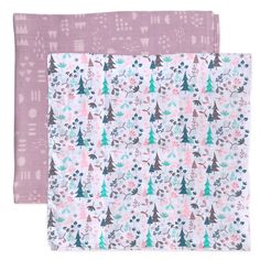 two pieces of pink and green patterned fabric with trees on the front, one in grey and