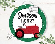 a personalized christmas ornament with a red tractor