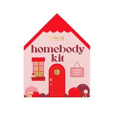 a pink cardboard toy house with the words, home body kit