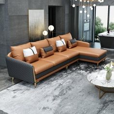 a living room filled with furniture and a chandelier